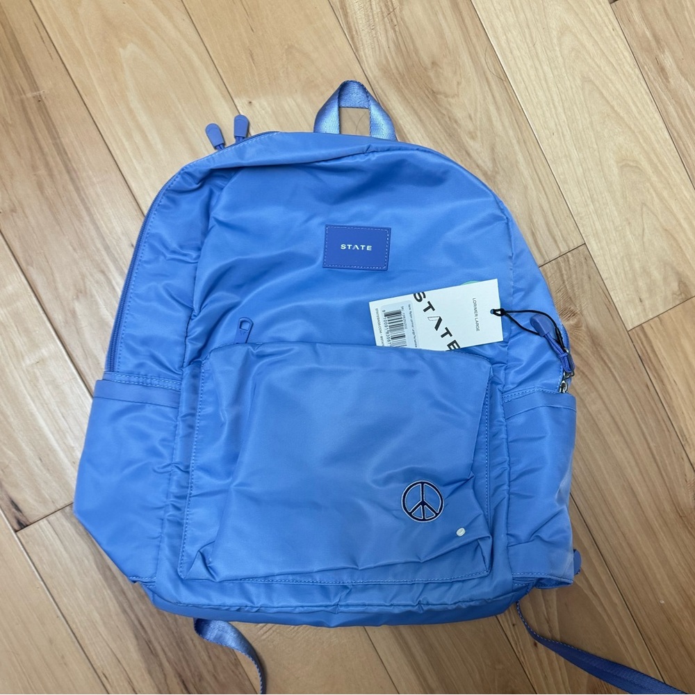 STATE BAGS / Reed backpack in periwinkle. Never been used.